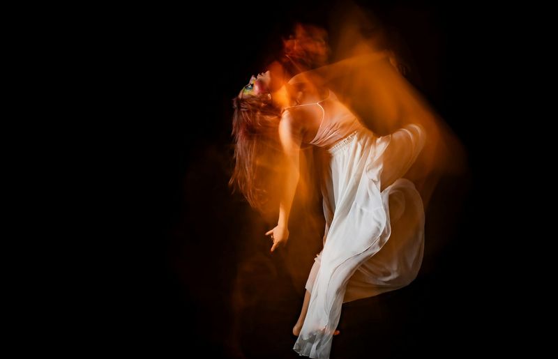 A person performing a fluid, dynamic movement.