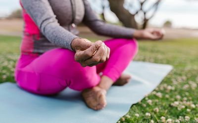 Close-up on a person's focused expression during exercise.